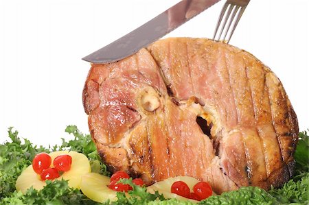 carving a gorgeous ham Stock Photo - Budget Royalty-Free & Subscription, Code: 400-04000769