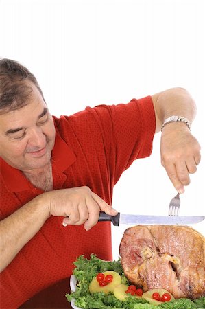 grandfather slicing a ham vertical Stock Photo - Budget Royalty-Free & Subscription, Code: 400-04000770