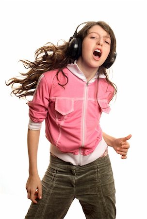 The girl listens to music and dances Stock Photo - Budget Royalty-Free & Subscription, Code: 400-04000857