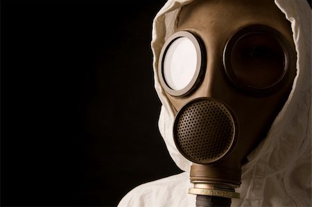 Person in gas mask on black background Stock Photo - Budget Royalty-Free & Subscription, Code: 400-04001107