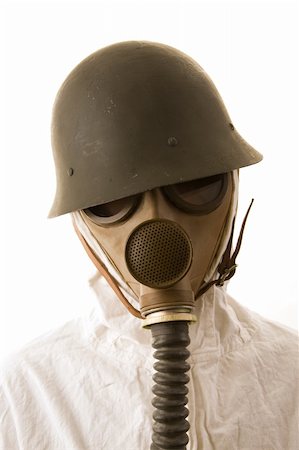 Person in gas mask and helmet on white background Stock Photo - Budget Royalty-Free & Subscription, Code: 400-04001110