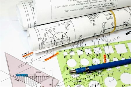 diagrammatic drawing in architecture - Isometric Drawings blueprint templates pen and rolls of engineering plans Stock Photo - Budget Royalty-Free & Subscription, Code: 400-04001273