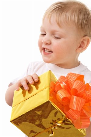 simsearch:400-05727835,k - happy child with gift box. On white background. Fotografie stock - Microstock e Abbonamento, Codice: 400-04001701