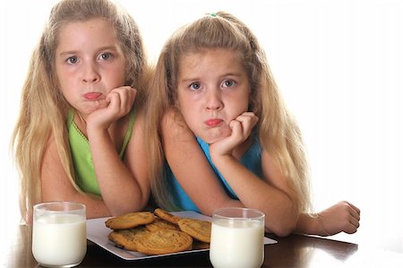 sibling sad - Can we please have a cookie? Stock Photo - Budget Royalty-Free & Subscription, Code: 400-04001880