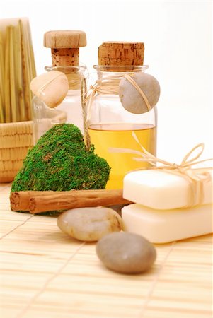smithesmith (artist) - Bottle with aromatic oil, soap and zen stones - Accessories for wellness, spa or relaxing Photographie de stock - Aubaine LD & Abonnement, Code: 400-04002525