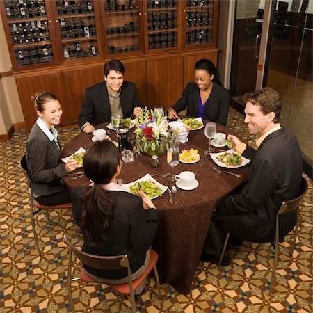 simsearch:400-08292251,k - High angle of group of businesspeople in restaurant dining. Stock Photo - Budget Royalty-Free & Subscription, Code: 400-04002662