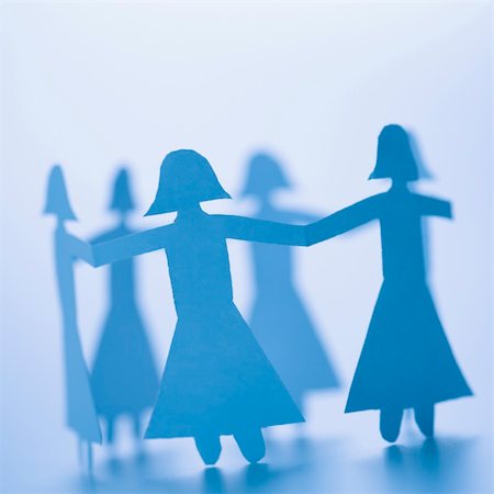 Paper cutout girls holding hands standing in circle. Stock Photo - Budget Royalty-Free & Subscription, Code: 400-04002755