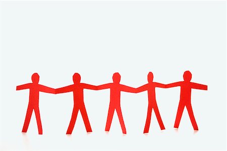 Red cutout paper men standing holding hands. Stock Photo - Budget Royalty-Free & Subscription, Code: 400-04002765