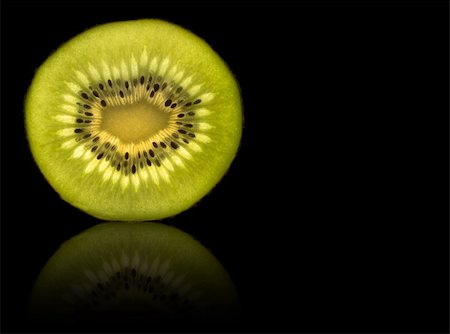 simsearch:400-04553701,k - Kiwi slice isolated on black with reflection Stock Photo - Budget Royalty-Free & Subscription, Code: 400-04002771