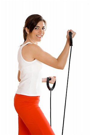 simsearch:400-07627460,k - Beautiful young woman making exercise on the gym Photographie de stock - Aubaine LD & Abonnement, Code: 400-04003203