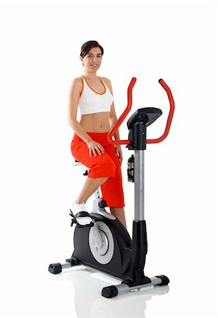 Beautiful young woman on the gym after making exercise Stock Photo - Budget Royalty-Free & Subscription, Code: 400-04003219
