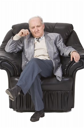 simsearch:400-05887166,k - Portrait of a senior man sitting in an armchair and thinking deeply.Shot with Canon 70-200mm f/2.8L IS USM Foto de stock - Super Valor sin royalties y Suscripción, Código: 400-04003637