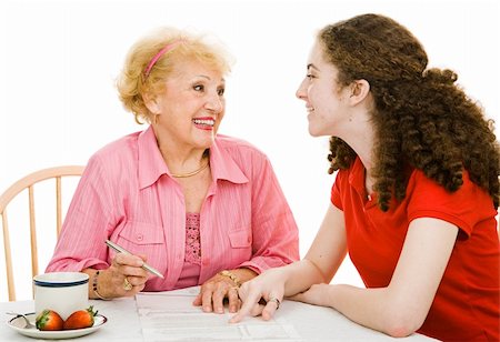 Senior grandmother and teen grandmother discussing democracy together and filling out absentee ballot.  Isolated on white. Stock Photo - Budget Royalty-Free & Subscription, Code: 400-04003775