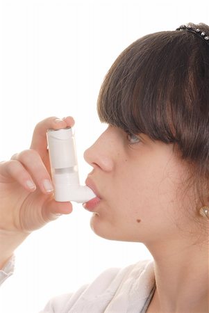 photo inhaler person - Teenage girl holding an inhaler isolated on white Stock Photo - Budget Royalty-Free & Subscription, Code: 400-04003909