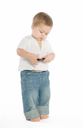 simsearch:400-04001701,k - A little boy experimenting with a cellphone Stock Photo - Budget Royalty-Free & Subscription, Code: 400-04014569