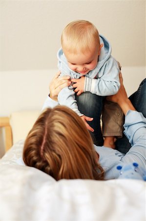 simsearch:400-04161658,k - Mother and her child have a fun Fotografie stock - Microstock e Abbonamento, Codice: 400-04014915