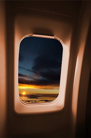 A sunset landscape from an airplane window. Stock Photo - Budget Royalty-Free & Subscription, Code: 400-04015156