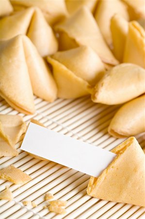 fortune cookies - one cookie open with blank fortune for your text. Entire text area in focus. Foto de stock - Royalty-Free Super Valor e Assinatura, Número: 400-04015177