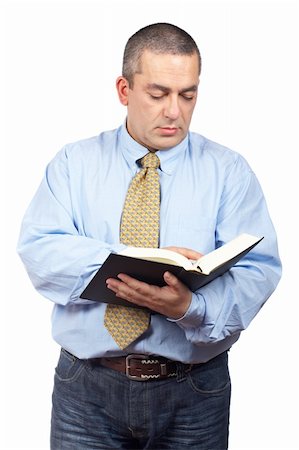 simsearch:400-04963726,k - Serious business man reading a book over a white background Stock Photo - Budget Royalty-Free & Subscription, Code: 400-04015498