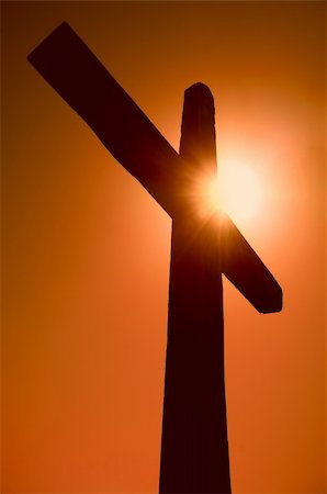 silhouette of jesus on the cross - silhouette of the cross against the sun on the sky Stock Photo - Budget Royalty-Free & Subscription, Code: 400-04015645