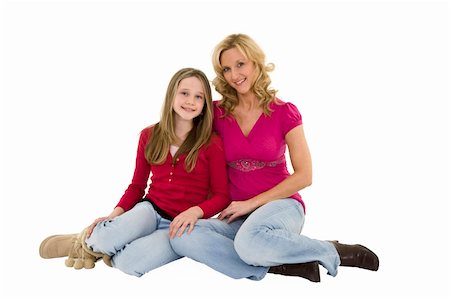 Mother and daughter seting on a white background together in casual clothing Stock Photo - Budget Royalty-Free & Subscription, Code: 400-04015938