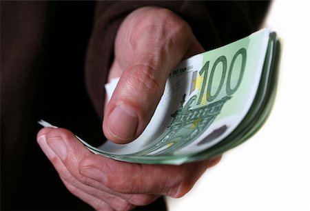 simsearch:695-05780246,k - Hand giving Euro banknotes money Photographie de stock - Aubaine LD & Abonnement, Code: 400-04016451