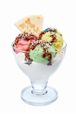 strawberry vanilla chocolate ice cream - Delicious multi flavor ice cream with chocolate syrup in glass bowl isolated on white background. Shallow depth of field Foto de stock - Super Valor sin royalties y Suscripción, Código: 400-04017103