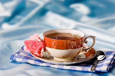 cup of tea with flower over azure Stock Photo - Budget Royalty-Free & Subscription, Code: 400-04017259