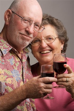 simsearch:400-04435288,k - Happy Senior Couple toasting with Wine glasses. Photographie de stock - Aubaine LD & Abonnement, Code: 400-04017414