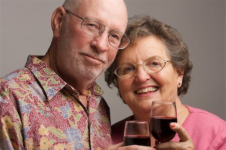 simsearch:400-04522125,k - Happy Senior Couple toasting with Wine glasses. Stock Photo - Budget Royalty-Free & Subscription, Code: 400-04017413