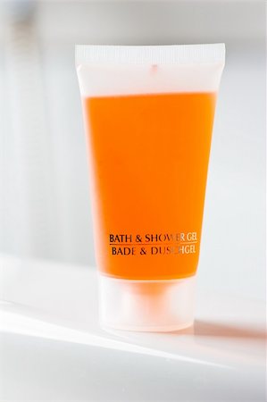 simsearch:400-08133885,k - Orange translucent bottles of bath- and showergel Photographie de stock - Aubaine LD & Abonnement, Code: 400-04018113