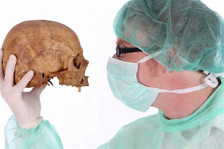 simsearch:700-00150546,k - Details surgeon with skull on white background Foto de stock - Royalty-Free Super Valor e Assinatura, Número: 400-04018308