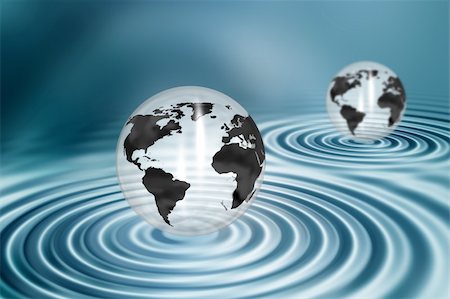 simsearch:400-03957244,k - Globes on water ripple background Stock Photo - Budget Royalty-Free & Subscription, Code: 400-04018686