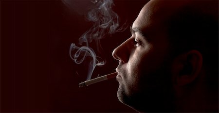 simsearch:400-04631926,k - close up of an smoking man Stock Photo - Budget Royalty-Free & Subscription, Code: 400-04018728