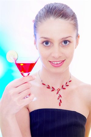 high-key portrait of young woman with cocktail  in multicolor back lights. Image may contain slight multicolor aberration as a part of design Stock Photo - Budget Royalty-Free & Subscription, Code: 400-04018882