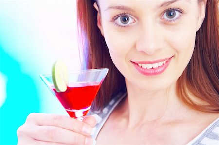 high-key portrait of young woman with cocktail  in multicolor back lights. Image may contain slight multicolor aberration as a part of design Stock Photo - Budget Royalty-Free & Subscription, Code: 400-04018913