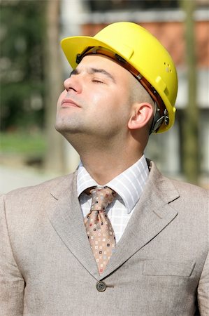 simsearch:400-04616755,k - Businessman with helmet dream Stock Photo - Budget Royalty-Free & Subscription, Code: 400-04019587