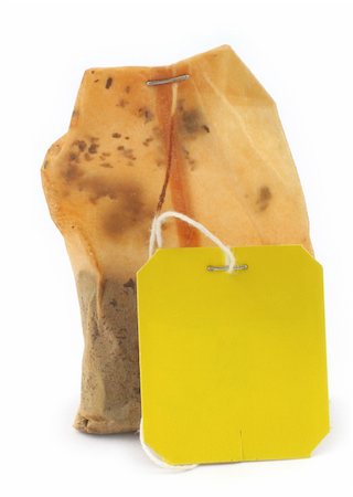 simsearch:400-05678542,k - used tea bag with an empty tag on white Foto de stock - Super Valor sin royalties y Suscripción, Código: 400-04019620