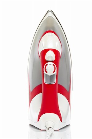 simsearch:400-04019890,k - Red electric iron reflected on white background. Shallow depth of field Stock Photo - Budget Royalty-Free & Subscription, Code: 400-04019892