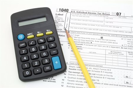 simsearch:400-05339747,k - calculator an pencil over 1040 tax form Stock Photo - Budget Royalty-Free & Subscription, Code: 400-04010124