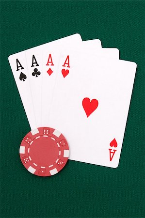 solitaire - Four aces and red chip on green linen Stock Photo - Budget Royalty-Free & Subscription, Code: 400-04010284