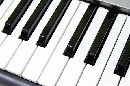 simsearch:400-05676575,k - close up on piano keys Photographie de stock - Aubaine LD & Abonnement, Code: 400-04010348