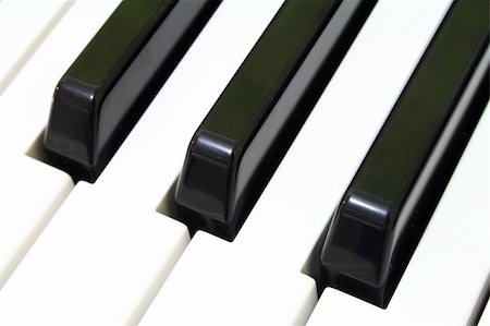 simsearch:400-05676575,k - close up on piano keys Photographie de stock - Aubaine LD & Abonnement, Code: 400-04010349