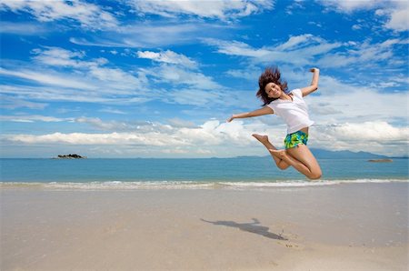 eyedear (artist) - young beautiful girl jump gracefully at the beach Stock Photo - Budget Royalty-Free & Subscription, Code: 400-04010523