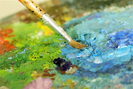 painter palette photography - big paintbrush is mixing colors on palette. Shallow DOF Stock Photo - Budget Royalty-Free & Subscription, Code: 400-04010781
