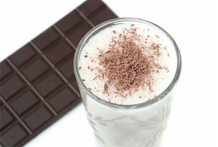 Glass with dairy chocolate drink on a white background Photographie de stock - Aubaine LD & Abonnement, Code: 400-04011140