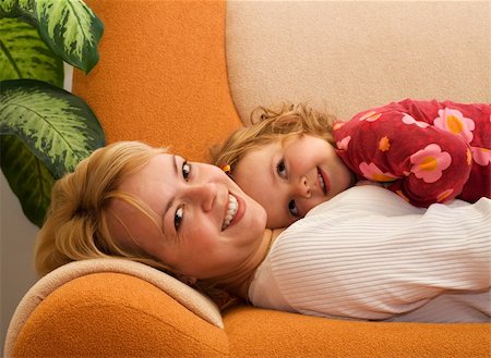 Happy mother and daughter sharing a tender moment Stock Photo - Budget Royalty-Free & Subscription, Code: 400-04011565