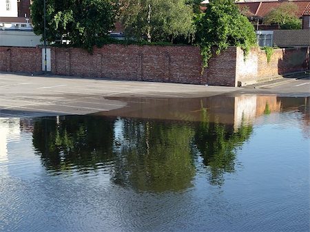 A municipal car park in Retford, UK affected by the flooding of the River Idle during the June 2007 extensive rainfall over the north of the UK Stock Photo - Budget Royalty-Free & Subscription, Code: 400-04011576