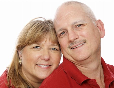 simsearch:400-05234340,k - Closeup headshot of a mature couple in love.  White background. Stock Photo - Budget Royalty-Free & Subscription, Code: 400-04011577