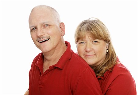 simsearch:400-04033107,k - Head and shoulders portrait of a happy mature couple.  Isolated on white. Stock Photo - Budget Royalty-Free & Subscription, Code: 400-04011578